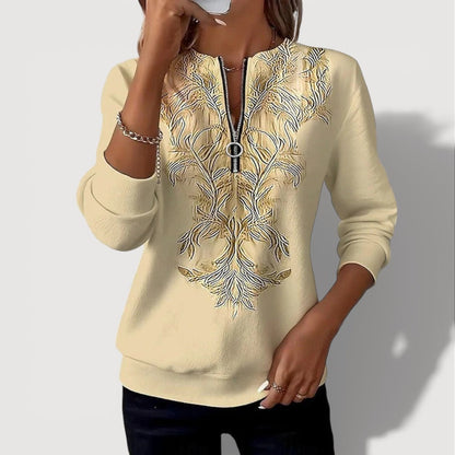 GENIEVA – EMBROIDERED ZIP TOP
